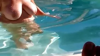 Naked by the swimmin-pool