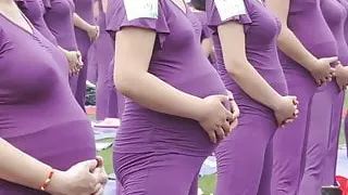 Pregnant Asian women doing yoga (non porn)