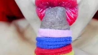 Justine bites, licks and sucks her long tied nipple