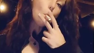 Consandra tyree smoking in leather jacket