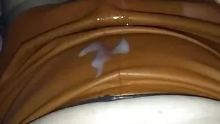 Cumming in tan leather skirt