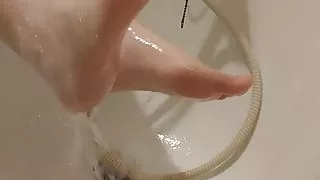 mistress washes her feet