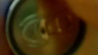 inserting a can of red bull