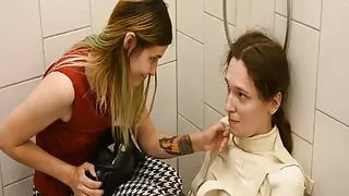 Water bondage in straitjacket and gas mask