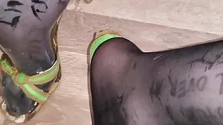 Pissing in condom over my nylon feet