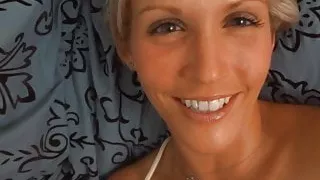 Pretty blonde fools around with a dick