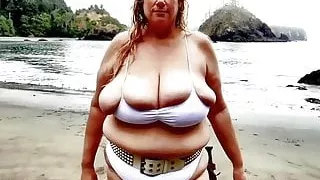 Huge tits BBW beauty emerges from the sea