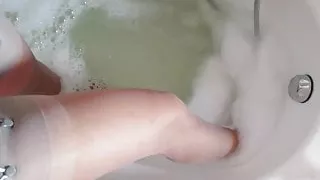 the slave slut of black cocks, takes a bath in stockings2