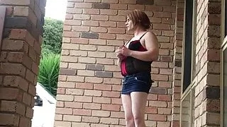Sissy outdoors daytime walk out front of house