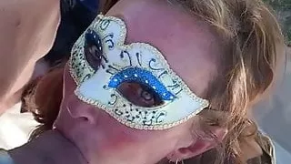 Wife blowing in wine field in france