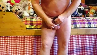 The oldie wants to make a workout with a plug in the butt.