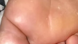 cumming on my aunts feet while watching television 