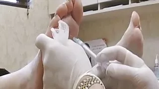 WWE AJ Lee feet mole implant