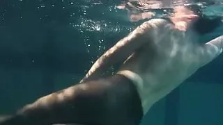 Dressed underwater beauty Bulava Lozhkova swimming naked