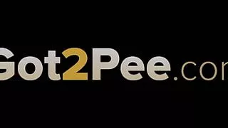 pregnant blonde pissing outside office.