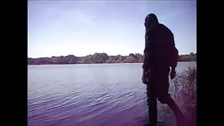 Swimming with PVC suit in the lake