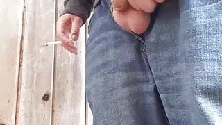 Pissing behind the barn