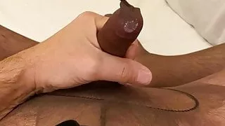 Crossdresser cumming in sheer nylons