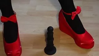 Mistress Juliette giving dildo a footjob