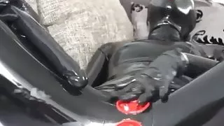 Girl in Latex using Dildo