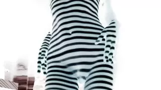 Female nude dancing in the light.