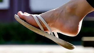 Feet 060 - Girls Soles Exposed While Wearing Flip Flops