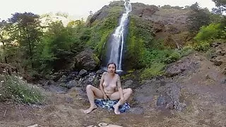 Watch hottie brunette Calliope masturbating at the waterfall