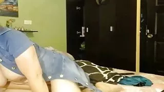 Angela in a denim dress