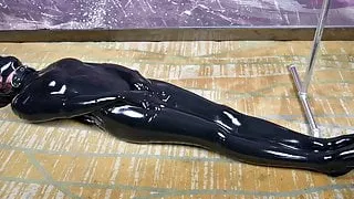 Asian cute latex slave girl Kiki in bondage and vacuum bag femdom