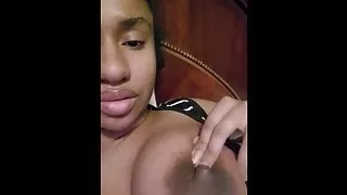 Black girl fondles big boobs and pumps milk on Youtube