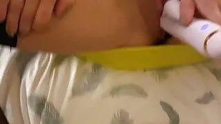 Wife still dressed using her vibrator