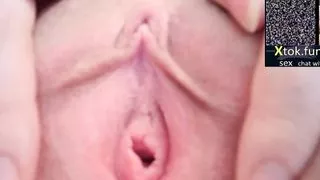 The girl showed her vagina and clitoris near the camera