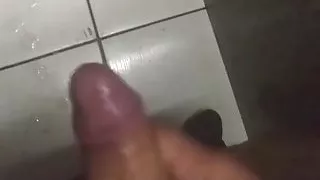 masturbating and cumming in the bathroom of bus station
