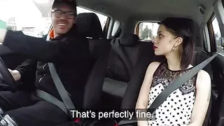 Petite british driving student rides instructor