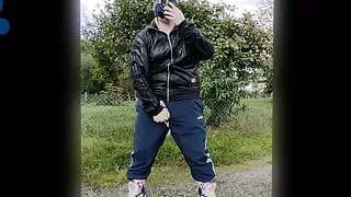 Adidas Pup pawing off outdoors sniffing Nike TN