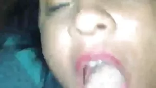 Black gal happily takes facial