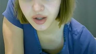 A pregnant girl gets naked and caresses her pussy