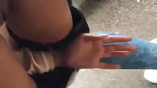 Mia peeing outside car