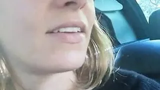 Woman rides the gear shift in her car in public