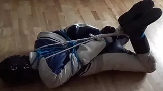 Bound in leather suit