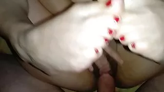 I hold my slave by her feet and fuck her pussy and ass