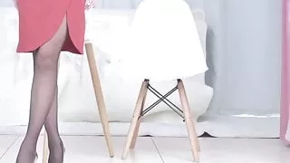 Asian girl shows pantyhose and outfit for a party 1