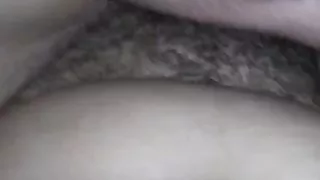 Fucking and cumming on her hairy pussy.