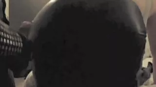 Leather Master cums on slave's leather skirt ass