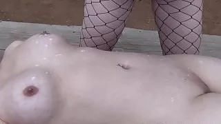 Lactation covering her with breastmilk