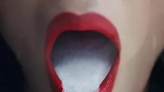 Ebony mouth full of nut