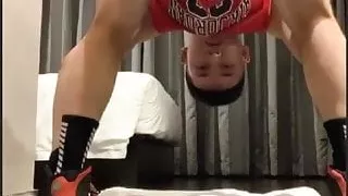 Sporty Asian guy is spreading legs and ramming ass with toy