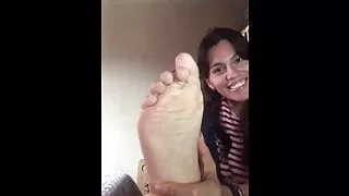 Self gagged with bare feet