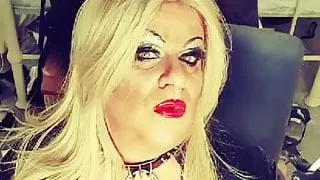 Smoking MILF with red lipstick in latex