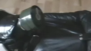 Leather straitjacket and breath control